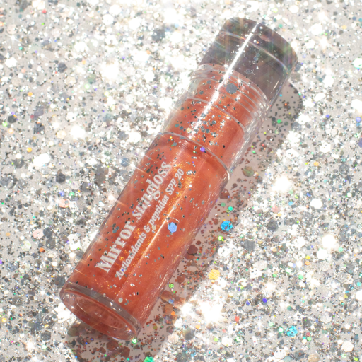 Солнцезащитный блеск для губ HUGS Mirror Sungloss Spurkling Bellini SPF 20+ PA++ 5,5 мл