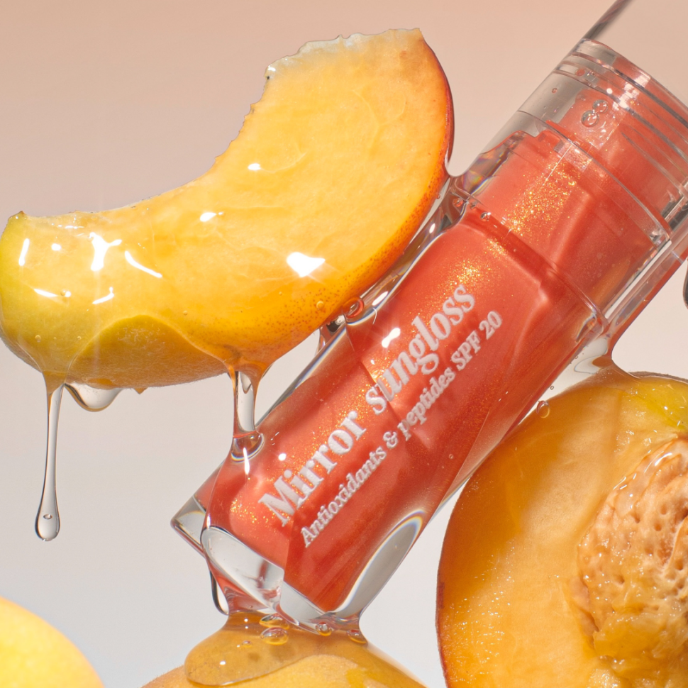 Солнцезащитный блеск для губ HUGS Mirror Sungloss Spurkling Bellini SPF 20+ PA++ 5,5 мл (Цена: 590 грн.)