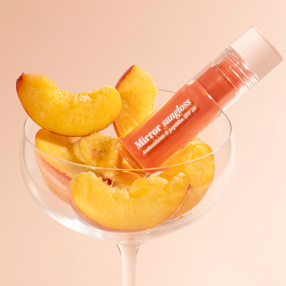 Солнцезащитный блеск для губ HUGS Mirror Sungloss Spurkling Bellini SPF 20+ PA++ 5,5 мл (Цена: 590 грн.)